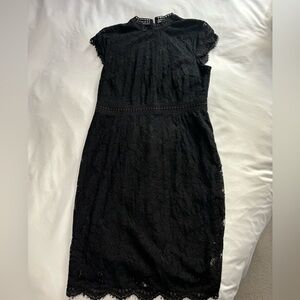 Women’s knee length black dress